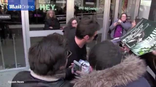 Hugh Jackman signs autographs for fans with bandage on nose   Daily Mail Online