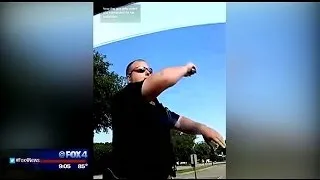 Officer smashes window after driver repeatedly refuses to comply