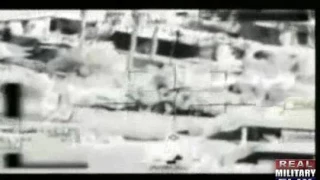 Aerial footage of soldiers destroying buildings