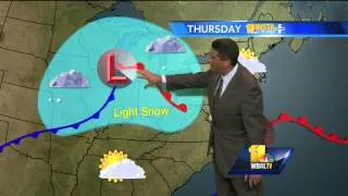 Rain to taper off tonight; snow possible tomorrow