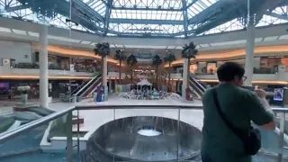 Schindler Glass Hydraulic Elevator Gardens Mall in Palm Beach Gardens Florida with Becca