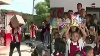 Barristas de Junior entregan kits escolares a niños barranquilla 🔴⚪