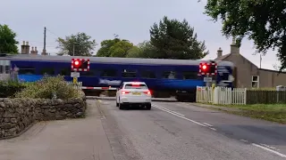 Scotrail 158714 at Nigg level crossing