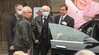 Jean-Paul Belmondo attends funeral of French comedian Guy Bedos | AFP