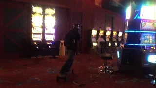 Skating through casino in Las Vegas with Evolve Electric Skateboards chased by security guards lol