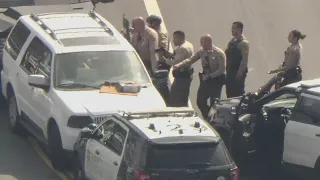 Suspect in custody after hour-long standoff in South LA