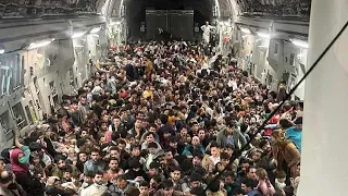640 Afghans Flee on Cargo Plane Designed for 150 Troops