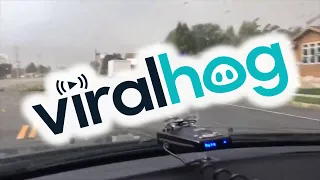 Utah Tornado Sends Debris Flying Across the Road || ViralHog