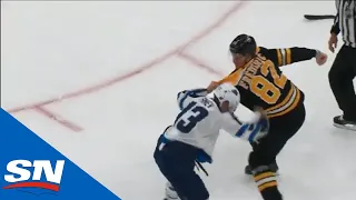 Trent Frederic Demolishes Brandon Tanev In First NHL Game, Parents Cheer and High-Five In Stands