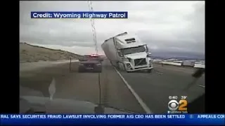 Tractor-Trailer Falls Onto Police Cruiser In Wyoming