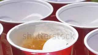 stock footage beirut beer pong drinking game slow motion splash