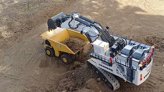super realistic rc liebherr r 9800 excavator and CAT 793D maintruck at work