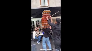 Hilarious Waiter Mishap: 100 Beers Spilled as Tower of Trays Wobbles!