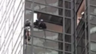 Video: Cops snatch man climbing Trump Tower in NYC