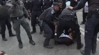 Israeli police use water cannon to clear ultra-Orthodox protesters outside Supreme Court hearing