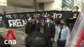 Hundreds protest outside Hong Kong court as 47 politicians, activists face subversion charges