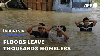 Indonesia reels as flood destroys thousands of homes | AFP