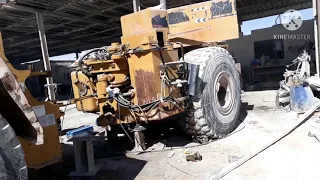 How to change caterpillar wheel loader 966F center joined baireng repair.URDU and HINDI