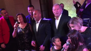 Members of the Vassallo family sing "Xemx" at Christmas Party