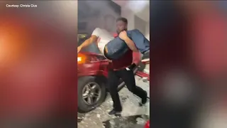 Florida man saves driver trapped inside burning car