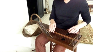 Music box tune on a lap harp or plucked psaltery