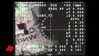 Raw Video: Soyuz Docks With Space Station