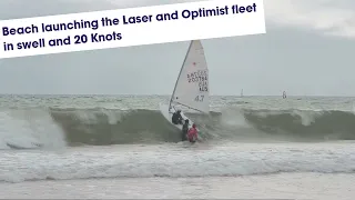 Beach launching the Laser and Optimist fleet with a nice shore break and 20 knots.