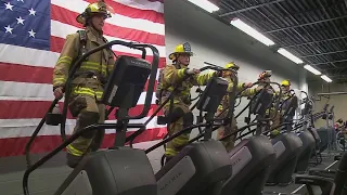 Firefighters walk 110 stories in memory of fallen 9/11 firefighters.