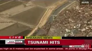 Tsunami Japon la vague arrive sur les terres 2011