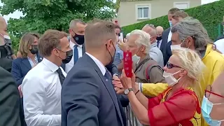 The moment Macron gets slapped during meet-and-greet