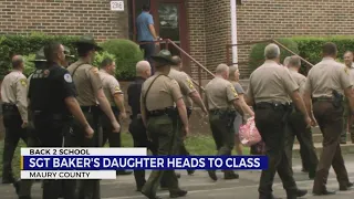 Law enforcement escorts fallen sergeant's daughter to class