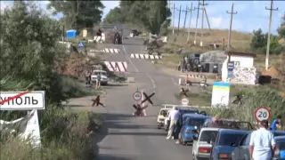 Ukraine Checkpoint Under Fire: Citizens take cover as sound of gunfire breaks out