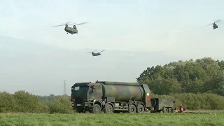 Heavy delivery America's Chinook loads heavy  tanks