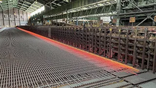 Process of mass production of rebar. A wonderful Japanese steel factory.