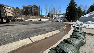 Mountain Green residents forced to remove belongings as mudslide slowly engulfs home