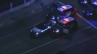 Chase ends in bizarre manner, camera crew emerges from police cruiser