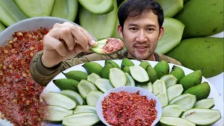 Mouth Watering Food with Green Mango with Salt Chili.