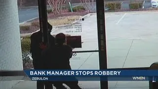 Bank manager stops robber