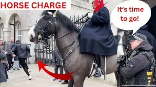 Guard Charges Them With His Horse