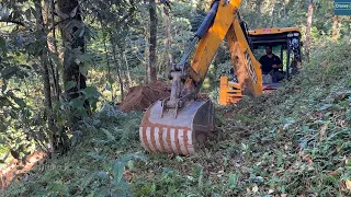 Cutting Down Hillside Shortly after Rain Gives Different Experience with JCB Backhoe