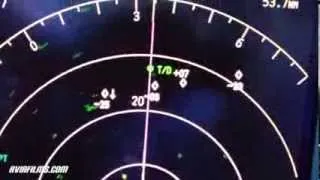 Air traffic on TCAS and real cockpit view