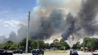 Brevard brush fire threatens homes in Sharpes