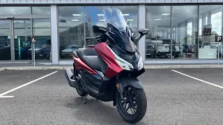 Honda Forza125 NSS125 scooter in Matt Carnelian Red