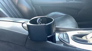 Slowmotion Mercedes W211 E55 AMG most over engineered cupholder in the world.