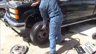 How to change front brake calipers and rotors on a GMC or Chevy 4x4 Dually