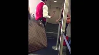 Lady at airport screaming over her missed flight.