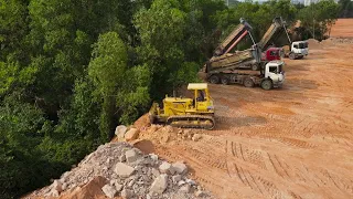 Next Construction Land Filling Up Mighty Power Bulldozer and Dump Truck Moving Stone in Processing