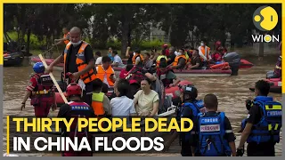 China floods: Workers racing to repair roads, restore power | WION