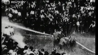 People are sprayed with high-pressure water (1917)