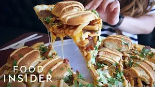 Pizza Is Topped With Cheeseburgers